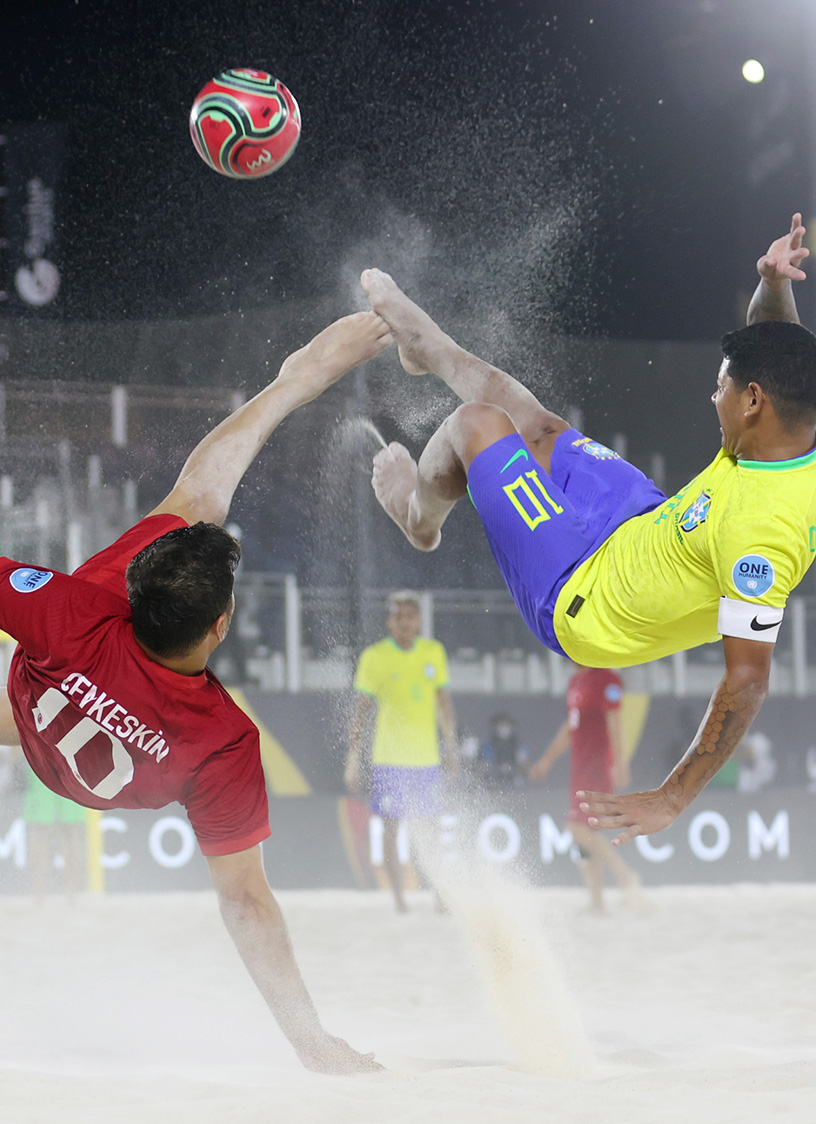 Athletes competing in the beach soccer cup in NEOM